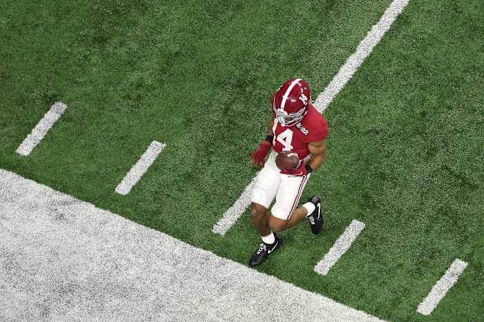 Brian Branch recovers the ball in bounds